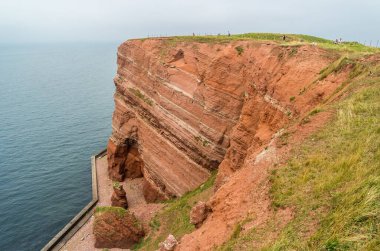 Rocks on Helgoland on the North Sea clipart