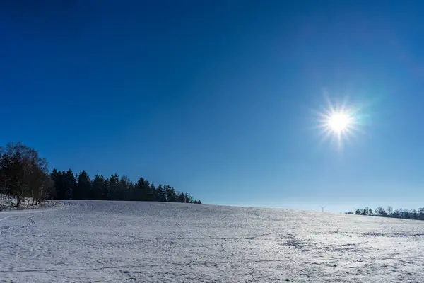 winter landscape with snow and sun star in the vogtland