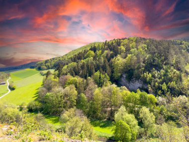 View over the Ahorntal in Franconian Switzerland, Bavaria germany at sunset clipart
