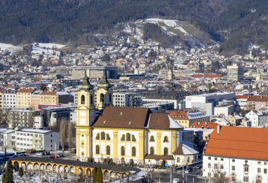 view of the city Innsbruck in Austria Tyrol with church clipart