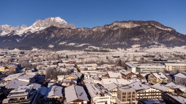 Panorama View of the the town Saint Johann at Wilder Kaiser in Austria Tyrol European Alps clipart