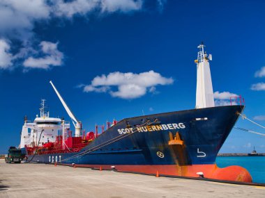 Bridgetown, Barbados - Jan 28 2024: The Scot Nuernberg, a Chemical and Oil Products Tanker, moored at the Port of Bridgetown, Barbados in the Caribbean. Taken on a sunny day with light clouds. clipart