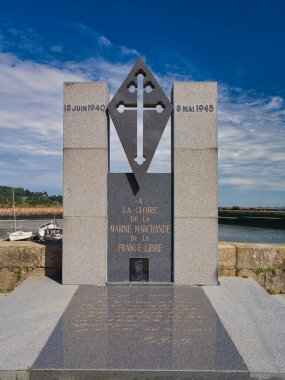 Paimpol, France - Sep 7 2024: At Paimpol in Brittany in northern France, the memorial to merchant seamen who died in the 2nd World War. Taken on a sunny day in late summer. clipart