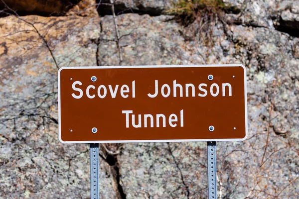 stock image Sign indicating Scovel Johnson Tunnel on the Iron Mount Road near Keystone South Dakota