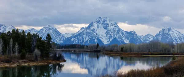 stock image Panorama view of snow covered Mount Moran and the Snake River from Oxbow Bend in Grand Teton National Park, Jackson Hole, Wyoming, USA during spring.