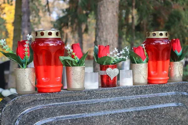 Stock image Lanterns on the tombstone in the public cemetery