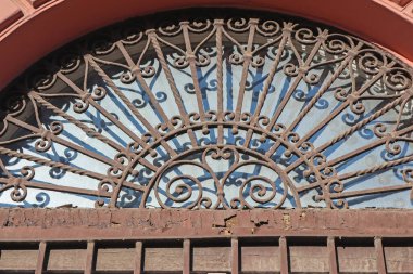 Wrought iron protector on a window of a house