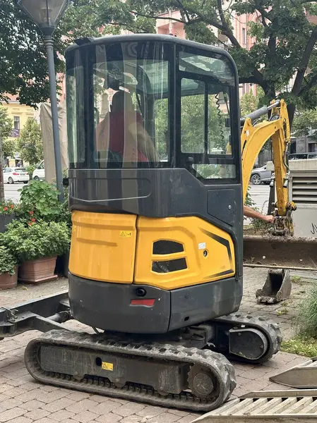 stock image Excavator at work on the city street