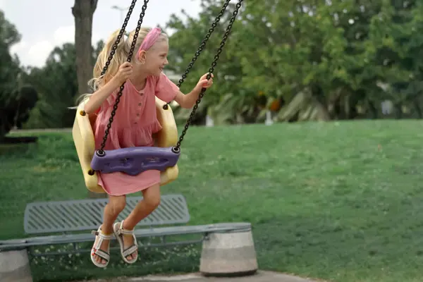 Joyful Girl Pink Dress Swings Delight Urban Parks Childrens Playground — Stock Photo, Image