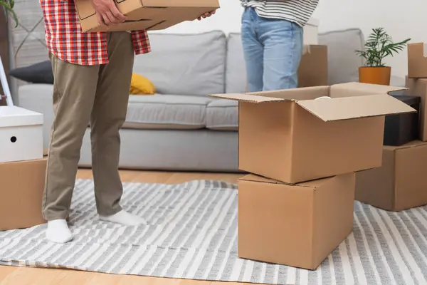 Couple Stands New Homes Living Room Surrounded Stack Cardboard Boxes — Stock Photo, Image