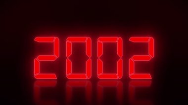 2000-2023 yılları arasında, yansıtıcı bir zeminde, kırmızı renkli bir LED ekranın video animasyonu 2023 yılını temsil ediyor.