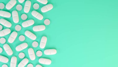 Beyaz tabletler, haplar - yeşil arka planda ilaç.