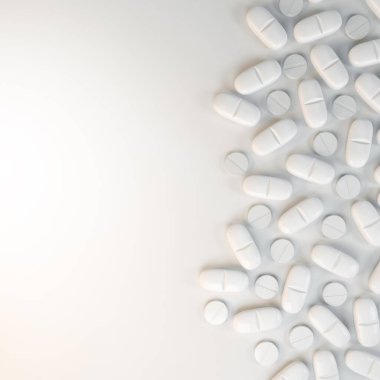 Beyaz tabletler, haplar - beyaz arka planda ilaç.