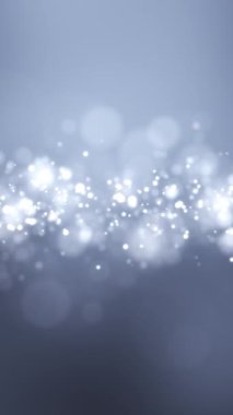 Işık parçacıklarının dikey video animasyonu bokeh.