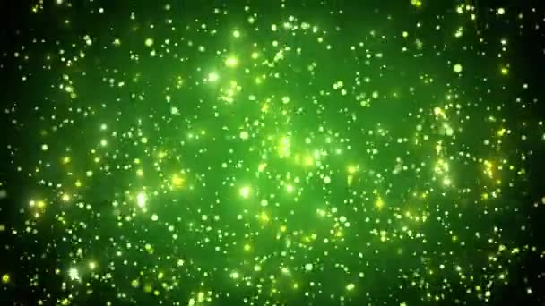金色闪光粒子的视频动画 在绿色背景上带有分散焦距的雨粒子 摘要移动背景 无缝圈 圣诞节和假期的概念 — 图库视频影像