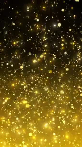 ゴールデン グリッター粒子の垂直ビデオアニメーション 黄金の背景に偏向したボケの雨粒子 抽象的な動きの背景 シームレスループ クリスマスと休暇のコンセプト — ストック動画