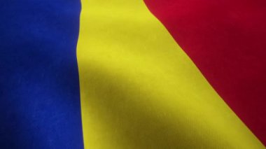 Kusursuz bir döngüde sallanan bir Romen ulusal bayrağının video animasyonu.