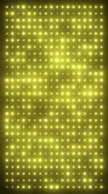 Soyut, sarı, parlak ampullü turuncu LED duvarın dikey video animasyonu - soyut arkaplan.