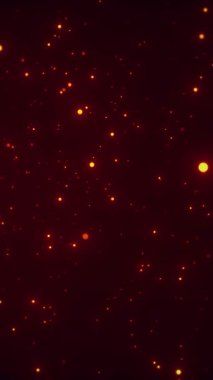 Kırmızı tonlarda parlayan küçük parçacıklar karanlık ortam boşluğunda süzülüyorlar. Atmosferik dijital arkaplanlar için yumuşak sürüklenen hareketli dikey animasyon.