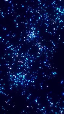 Uzayda yüzen parlak mavi noktalardan oluşan yoğun bir bulut. Yüksek parlaklık ve derinliğe sahip dikey dijital parçacık alanı.