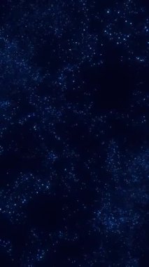 Parlayan mavi parçacıkların dikey animasyonu uzayın derinliklerinde yavaşça uçar. Bilim kurgu ve fütüristik altyapılar için soyut hareket