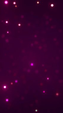 Pembe ve mor tonlarda yüzen yumuşak parlak parçacıklar. Çevre hareketi ve görsel arkaplanlar için dikey soyut animasyon.
