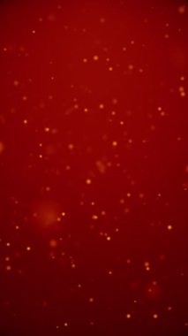 Parlayan kırmızı-turuncu parçacıkların dikey animasyonu havada yavaşça yüzüyor. Ortam ve şenlik arkaplanları için soyut hareket