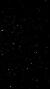 Siyah toz ve beyaz parçacıklar koyu arkaplanda, parçacık uçuş animasyonu, yüksek kaliteli parçacık arkaplanı