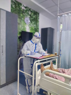 Jaipur, India Circa 2022: Picture of doctors wearing PPE kit working in Covid Ward. Corona virus covid-19. Healthcare workers
