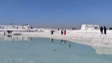 Jaipur, India Circa 2023:Time lapse Footage of a river hill covered with snow in background shot during daylight. White snowy mountain hills, nature, landscape in winter. Trekking and hiking. Adventure love