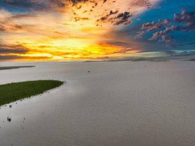 Landscape shot of bank side of a river shot against a beautiful sunset. Chacha Kota view point at Banswara Rajasthan clipart