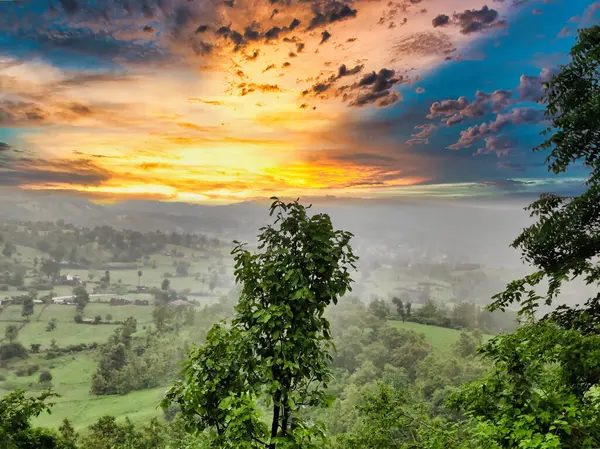 stock image Landscape shot of hills and trees shot against a beautiful sunset. Chacha Kota view point at Banswara Rajasthan