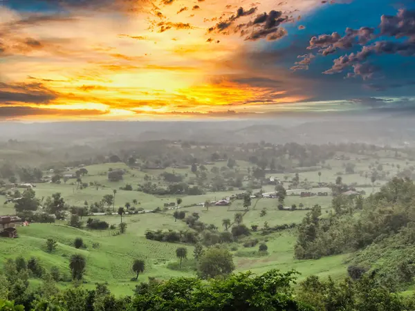 stock image Landscape shot of hills and trees shot against a beautiful sunset. Chacha Kota view point at Banswara Rajasthan