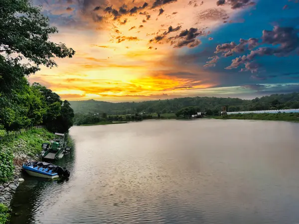 Stock image Banswara, Rajasthan, India 9 August 2024:Landscape shot of bank side of a river shot against a beautiful sunset