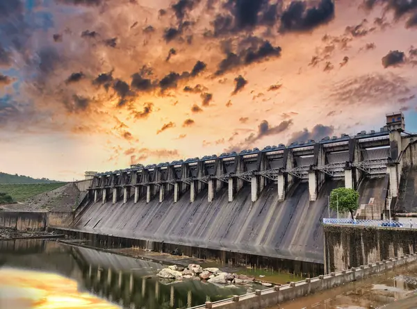 stock image Banswara, Rajasthan, India 9 August 2024: Picture of gates of Mahi Dam situated at Banswara shot against a beautiful sunset