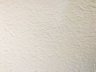 Boş gri arka plan, eski ve güzel bir beton duvarı gösteriyor..