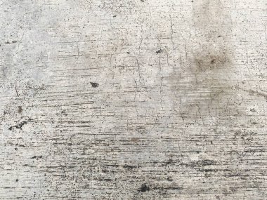 Koyu ve izole beton doku, çok yönlü ve etkili bir tasarım elementi sunuyor.