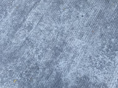 Eski bir beton duvar, yıpranmış ve yıpranmış, herhangi bir projeye karakter katıyor..