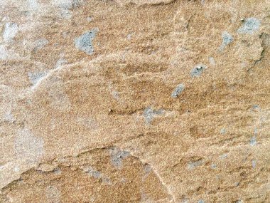 Kentsel alanlara doğanın bir dokunuşunu getiren taş desenli bir duvar kağıdı.