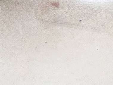 Betonun pürüzlü yüzeyi ilginç bir görsel şablon oluşturuyor..