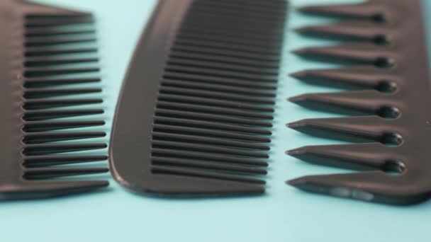 Close Professional Combs Color Background — Stock Video