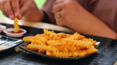 detail shot of French Fries on table .