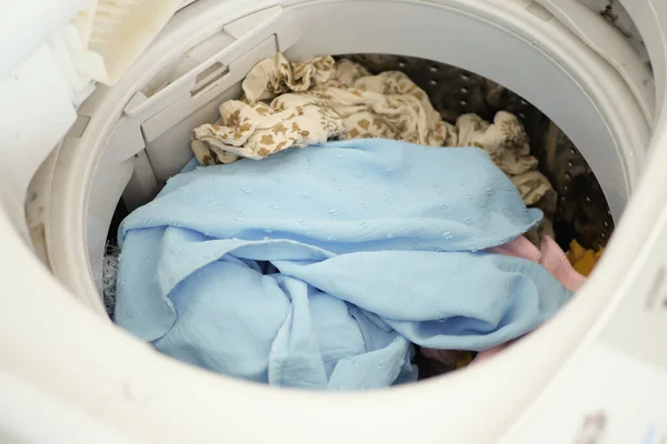 stock image  close up of cloths in a washing machine