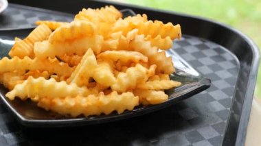 detail shot of French Fries on table .