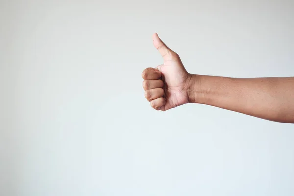 stock image man hand showing a thumb-up .