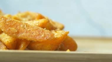 detail shot of French Fries on table .