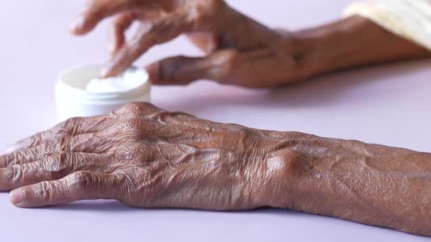 Senior Woman Applying Beauty Cream Skin — Stock Video
