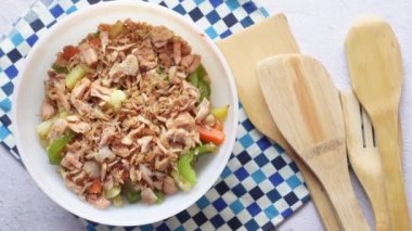  tuna with a mixed vegetables in bowl on white,