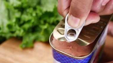 close up of canned meat on table ,