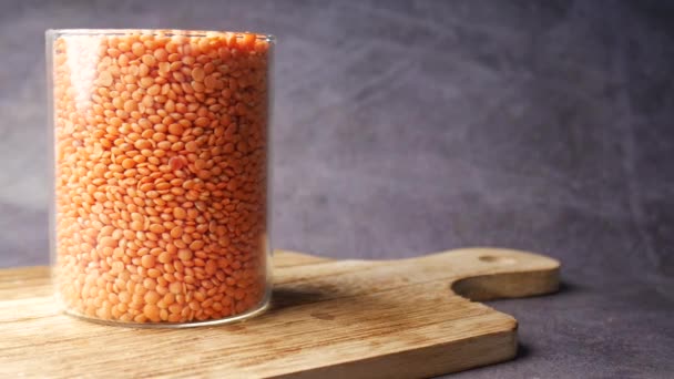 Jar Uncooked Dhal Chopping Board — Video Stock